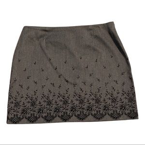 EUC size 9/10 Express skirt. Gray Stretch material with velvet detail.